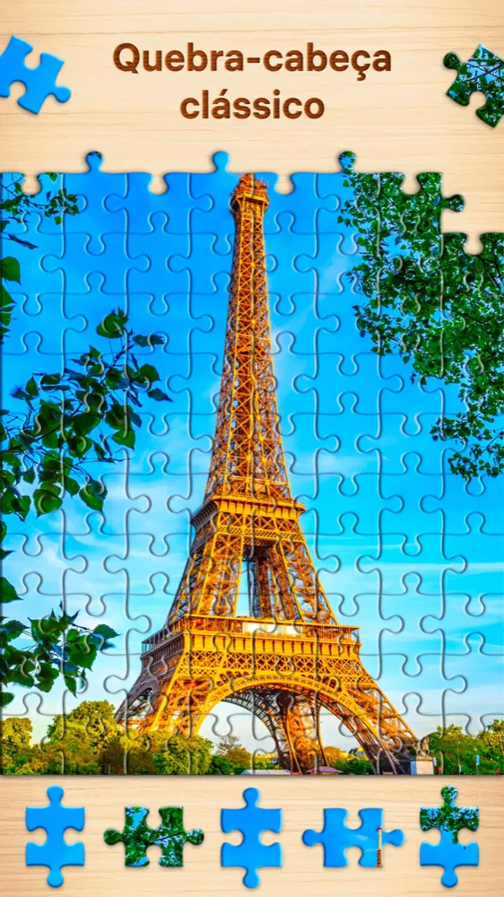 Quebra-cabeças montado com a imagem da Torre Eiffel sobre uma mesa de madeira clara